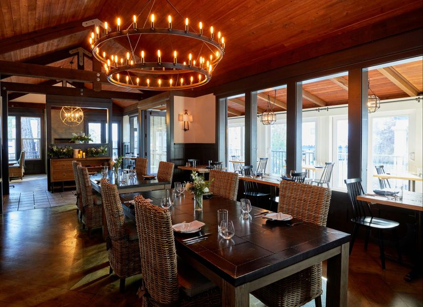 The Stavrand Russian River Valley in Guerneville, elegant dining room with chandelier and large windows