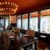 The Stavrand Russian River Valley in Guerneville, elegant dining room with chandelier and large windows