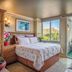 Castle @ Waikiki Grand room with bed, balcony, and tropical Honolulu views