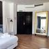 Flats Friends Plaza de la Reina Valencia room with bed, space mural, full-length mirror and black door