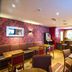 Premier Inn Edinburgh Airport - M9 Jct1 bar lounge with seating and tables in Edinburgh