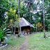 Nypa Style Resort Camiguin in Mambajao, thatched cottage surrounded by tropical garden
