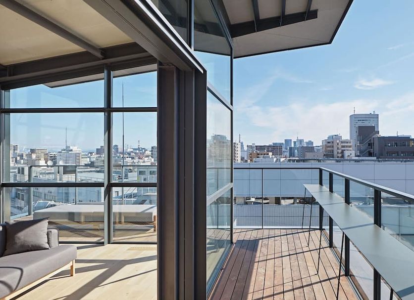 9h nine hours Nagoya station rooftop terrace with city skyline and glass railing in Nagoya