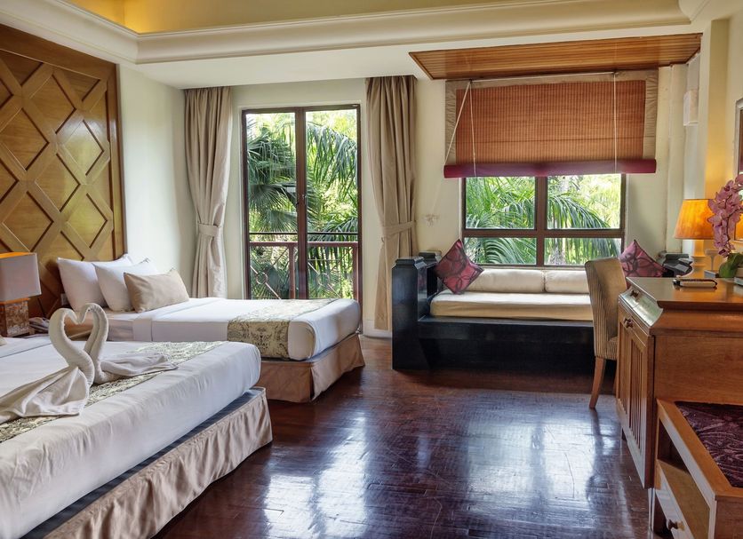 Lagoon Residence @ Langkawi room with twin beds, window daybed, desk, and tropical garden view