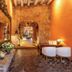 Hotel El Marqués by Faranda Boutique in Cartagena, ornate colonial interior with arched doorway and seating