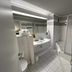 Hotel Am Schloss Ahrensburg bathroom with walk-in shower, sink, toilet and tiled floor