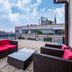 Clarion Hotel Prague Old Town rooftop terrace with seating and city views in Prague