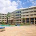 Mombasa Continental Resort in Mombasa with poolside loungers and a large outdoor swimming pool