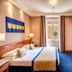 Hotel Diocleziano Rome guest room with twin bed, desk, TV and window view