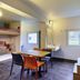 Hotelf1 Villemomble room with bunk beds, small table, sink, and window