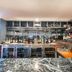 Twin Towers Inn Artarmon hotel bar with marble counter, stocked bottles and glassware