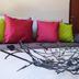 Flora Daisy Apartment in Borovets with colorful pillows and decorative centerpiece on a sofa