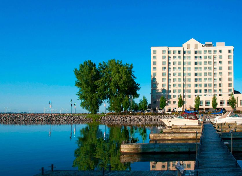 Residence Inn by Marriott Kingston Water's Edge overlooks a calm waterfront marina in Kingston