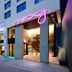 Moxy Seoul Insadong entrance in Seoul with neon sign and colorful mural exterior