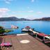 Light Morning in Yuchi Township with lake view, dock, and rooftop terrace