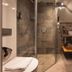 Bathroom at Buitenplaats Kasteel Elsloo in Stein with walk-in shower, vessel sink and heated towel rail