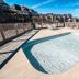 Barrier Island Station in Duck, outdoor pool with deck and surrounding condominium buildings