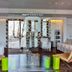 Mediterranea Hotel & Convention Center in Salerno lobby with seating area and glass partition