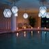Fonteverde Lifestyle & Thermal Retreat indoor pool with lantern lights in San Casciano Dei Bagni