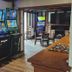 The Bell in Bury St. Edmunds with slot machines in a pub-style lounge and seating area