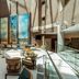 Atrium lounge at Delta Hotels by Marriott Olbia Sardinia in Olbia with tall windows and seating