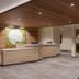 Fairfield Inn & Suites by Marriott Ottawa Airport lobby with front desk, wood ceiling and seating area