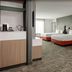 SpringHill Suites by Marriott Beaufort guest room with two beds and a work desk in Beaufort