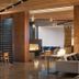 Hotel San Luis Obispo lobby with front desk, lounge seating and fireplace in San Luis Obispo
