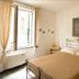 Affittacamere Da Cesare in Monterosso al Mare: simple guest room with wrought-iron bed and open window