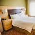 TownePlace Suites by Marriott Aberdeen guest room with king bed, nightstands and window view