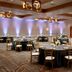Chicago Marriott Southwest at Burr Ridge ballroom with round banquet tables and gold chairs in Burr Ridge