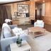 Bryce Uptop Lodge in Bryce with a cozy lounge, seating area, wood-paneled walls, and coffee table