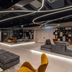 Hotel Vision Budapest by Continental Group lobby with modern seating and curved ceiling lights in Budapest
