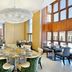 Hilton Suites Jabal Omar Makkah in Mecca dining room with chandelier and large windows