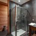 Pêche De Vigne & Spa in Rodern bathroom with glass shower and stone sink vanity