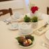Tenuta Cavalieri, Leverano: breakfast table set with cups, teapot, flowers, figs and glasses