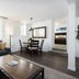 The Kimball at Temple Square, Salt Lake City: living room with sectional sofa, coffee table and dining area