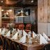 Original Sokos Hotel Arina in Oulu dining room with a long set table and pendant lights