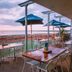 Onslow Beach Resort in Onslow seaside terrace dining with ocean views at sunset