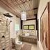 Patrick's on the Beach Resort in General Luna bathroom with walk-in shower, vanity and toilet