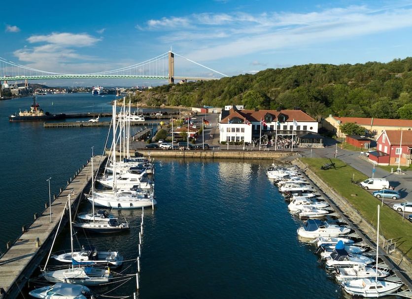 Thon Hotel Dockyard in Västra Frölunda overlooking a marina with yachts and a bridge