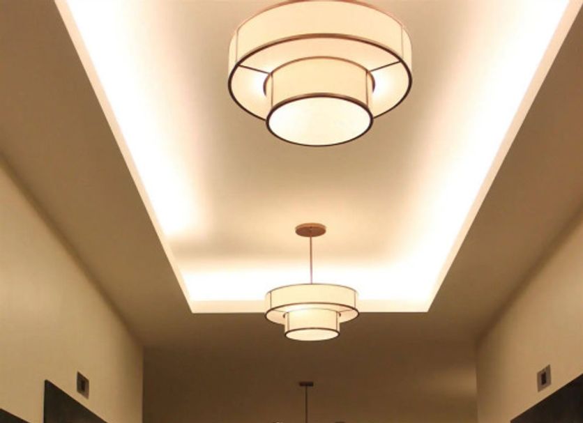 Home Edge Accommodations @ Tivoli Garden Residences Manila hallway with modern ceiling lights and glossy floors
