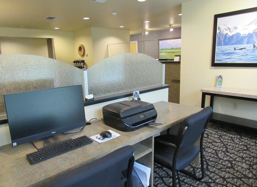 Aspen Suites Hotel Kenai office area with computer, printer, and desk chairs