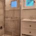 Le Clos Loret in Saint-Germain-du-Corbéis bathroom with tiled walk-in shower, sink vanity and windows