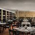 Protea Hotel by Marriott Bloemfontein restaurant with set tables and chairs in a spacious dining room