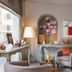 Hôtel Edmond Rostand Marseille lounge with gray armchairs, arched alcoves, and window-side table lamps