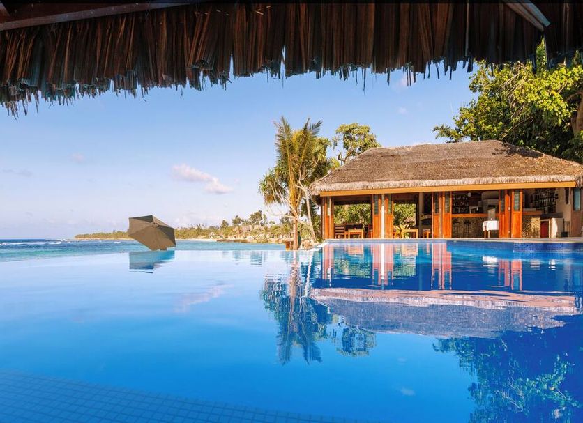 Breakas Beach Resort in Port Vila with infinity pool overlooking the ocean and beachfront bungalows
