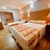 Hotel Porto Salvador in Salvador guest room with two beds and wood flooring