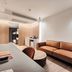 Citrus Sukhumvit 13 Nana Bangkok by Compass Hospitality room with sofa, desk, and kitchenette area