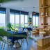 Brenta Phu Quoc Hotel lobby lounge in Phu Quoc with seating and wood shelving